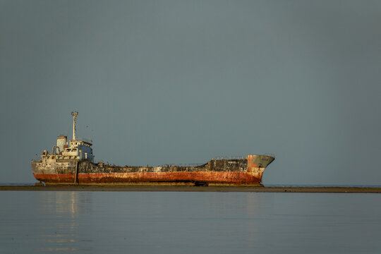 A rusted cargo ship named Tervel lies stranded on a shallow sandbar, Northern Red Sea, Massawa, Eritrea