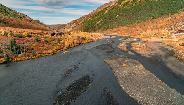 Savage River surrounded by colorful autumn tundra in Denali National Park, Alaska