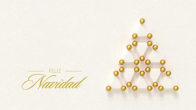 Christmas tree made from embossed paper triangles and golden baubles. Spanish language Merry Christmas message (Feliz Navidad) appearing and dissolving. Loopable video