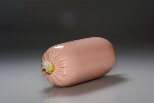 Packaged liver sausage on neutral background, symbolizing tradition, simplicity and everyday culinary culture
