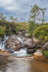 Water cascades over mossy stones in a quiet, wild stream in the Glen Rosa valley on Arran, Scotland © nicholasjermy