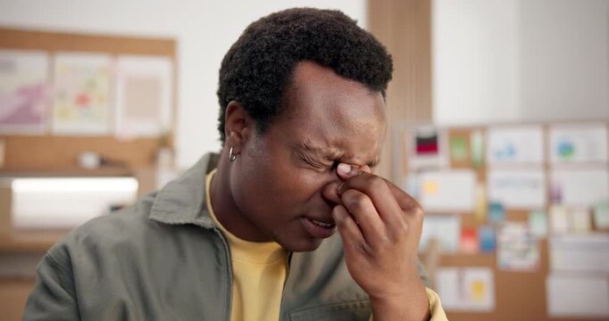 Stress, creative and man in office with headache, strain and pressure for article deadline. Business, publishing and African person with migraine, head pain and fatigue for burnout at media agency