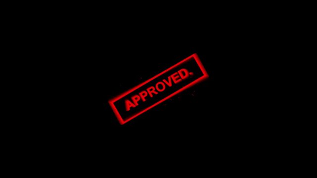 Approved stamp animation with red glowing text on a black background