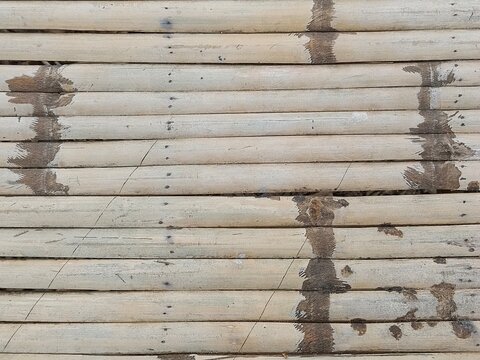 Weathered horizontal bamboo slat floor texture in rustic oriental design