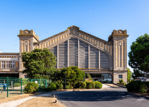 Cherbourg, France - July 19, 2026: North facade of the hall of the former Transatlantic Maritime station, home to the Cite de la Mer maritime museum dedicated to submarine exploration, open in 2002.