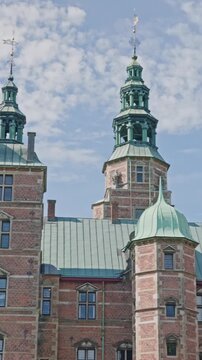 Copenhage, Denmark. August 13, 2026, Majestic Rosenborg Castle in Copenhagen, a stunning example of Renaissance architecture with its red brick facade and copper green roof