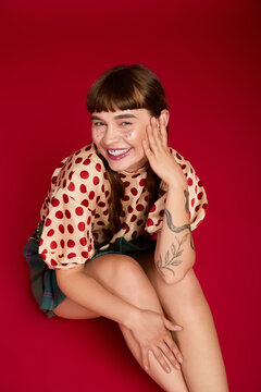 Bright and cheerful woman embraces vibrant fashion and joyful self expression
