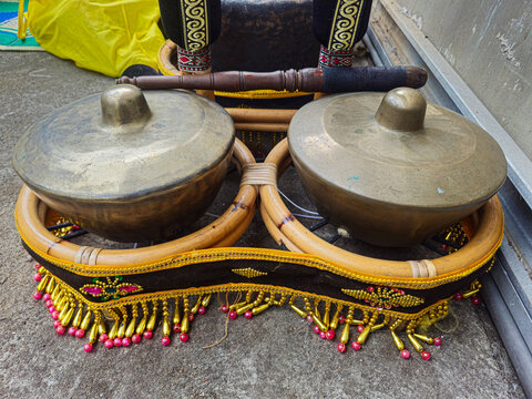 Kethuk and kempyang, traditional Indonesian gamelan instruments made of bronze, used as rhythmic and structural elements in Javanese and Balinese musical ensembles.