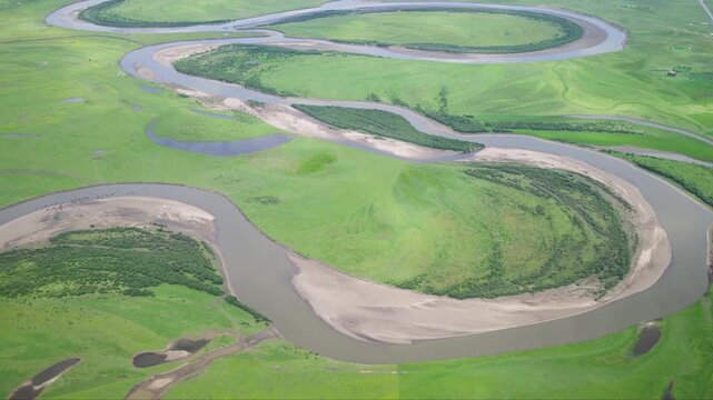 High-Angle Aerial Close-Up View of Meandering Baihe River in Zoige Grassland: Yellow River Upper Reaches, Winding Stream, Shoals, Earth Texture and Green Meadow Background