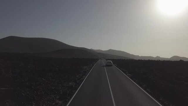 Vehicle on a remote volcanic highway