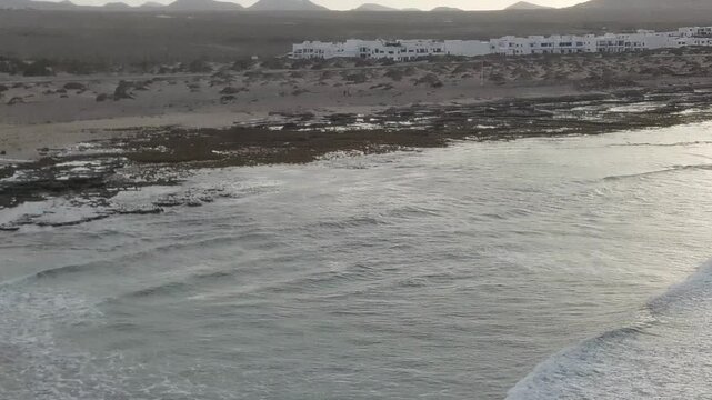 Wave line beside a rocky shoreline