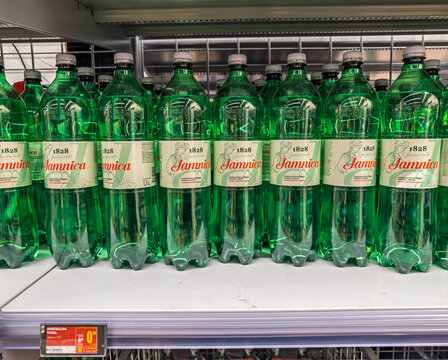 Lubiana, Slovenia- September 9, 2026:  Retail store display of Jamnica mineral water bottles, historic 1828 brand from Croatia, price tag showing sale percentage below