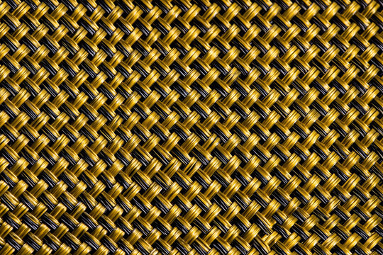Close Up Gold and Black Carbon Fiber Weave Texture