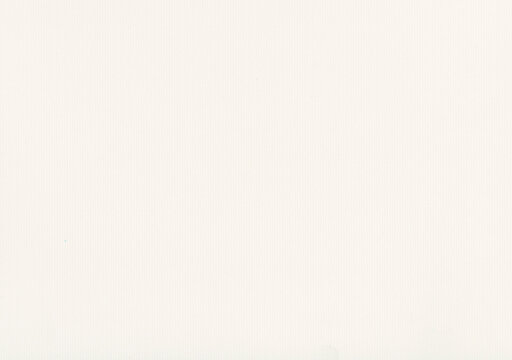 Ribbed white stationery paper places narrow parallel grooves beneath calligraphy, the faint raised grain extending along a blank sheet suitable for correspondence and textured journal pages