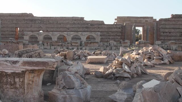Fallen stone blocks at the ancient ruins of Leptis Magna Libya