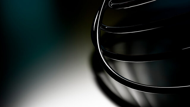Metal whisk utensil with wire loops on dark background