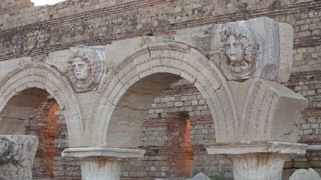 Two Gorgon head medallions at Leptis Magna ruins in Libya