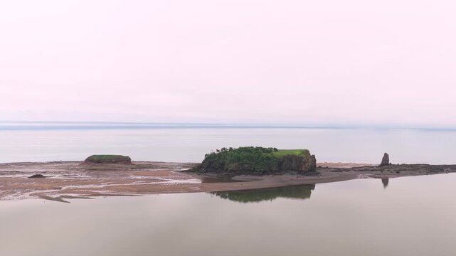 Aerial Drone View of Tidal Island and Sea Stack in Nova Scotia