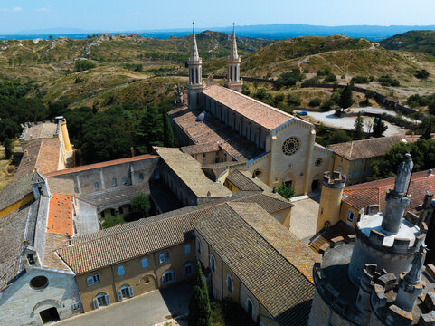 Aerial view of Frigolet Abbey church among buildings