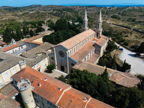 Frigolet Abbey church and tiled roofs from the air