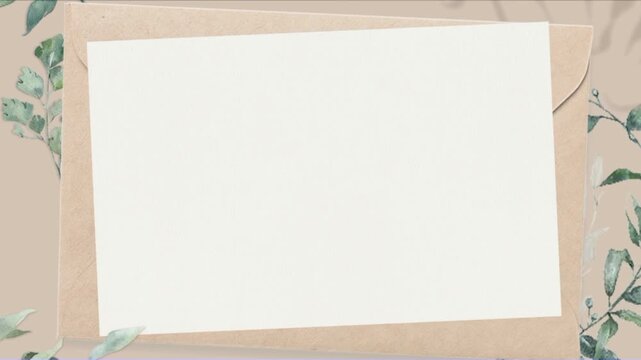 Blank paper cards on brown envelopes with green watercolor foliage