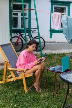 a woman enters data onto a card