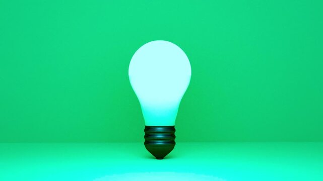 Glowing light bulb animates with green background and base