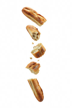 Flying baguette chunks on transparent bg.