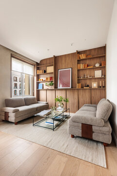 Modern living room with wooden wall