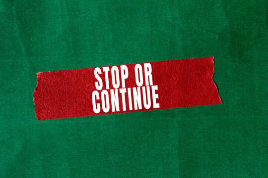 Stop or Continue text concept photo