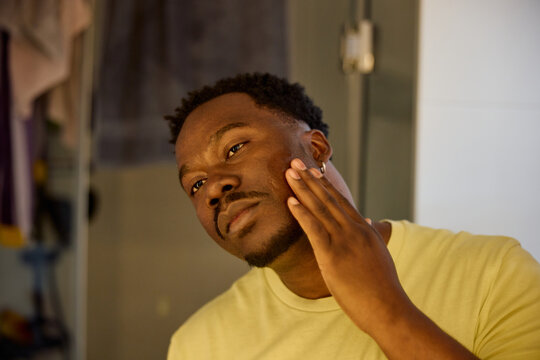 Man takes care of his face