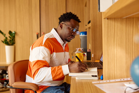 Man works in his home study