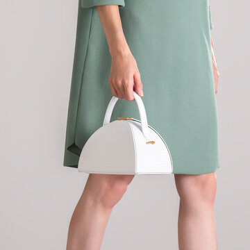 Mint Dress With White Handbag Fashion Detail