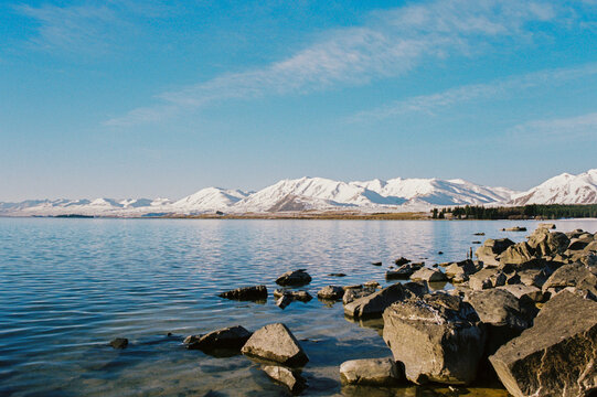Majestic Snow-Capped Mountains Reflecting on Water