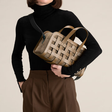 Leather Woven Handbag Styled With Black Turtleneck
