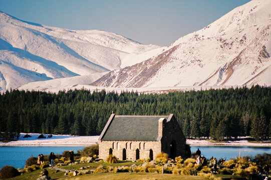 Charming church surrounded by scenic mountain range