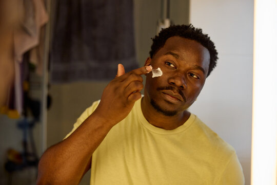 Man takes care of his face