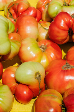 Fresh whole heirloom tomatoes closeup
