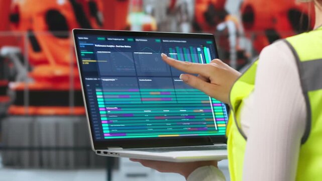 Woman Engineer Checks Scada System On Computer Screen