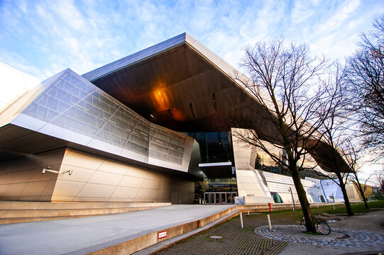 The modern entrance and cantilevered roof architecture of BMW Welt in Munich, Germany on 5 Feb 2016