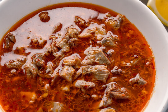 Traditional Turkish Kelle Paca Soup on Stone Table Background