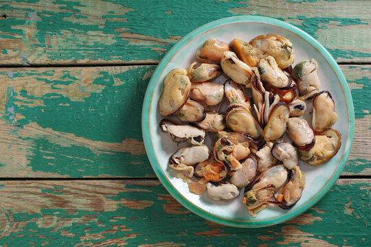 Peeled Mussels on Green Table