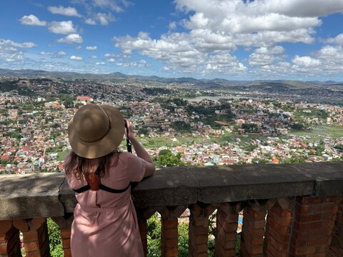 Photographer at the Rova Balcony Overlooking Antananarivo and Lake Anosy