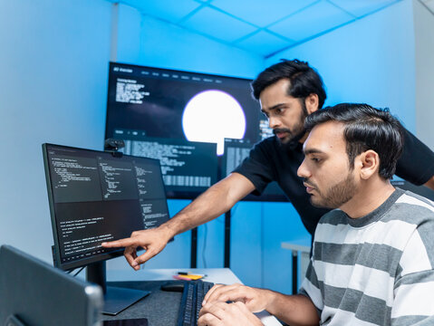 Software engineering use computer working develop AI office are assisting algorithm systems or verifying code. Programmer teamwork using artificial intelligence on laptop analysis or writing coding
