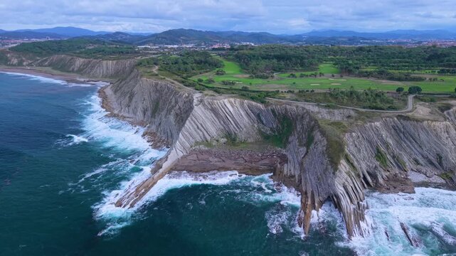 Aerial view from a drone of the Flysch of Bizkaia on the Cantabrian Sea coast between Algorta and Bakio. Province of Bizkaia. Basque Country. Spain. Europe.