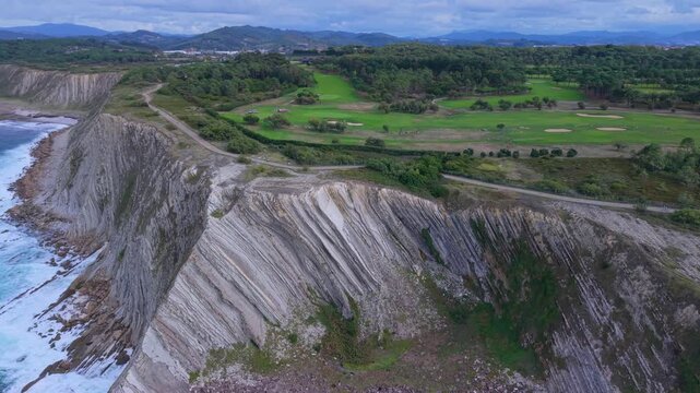 Aerial view from a drone of the Flysch of Bizkaia on the Cantabrian Sea coast between Algorta and Bakio. Province of Bizkaia. Basque Country. Spain. Europe.