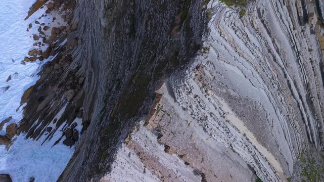 Aerial view from a drone of the Flysch of Bizkaia on the Cantabrian Sea coast between Algorta and Bakio. Province of Bizkaia. Basque Country. Spain. Europe.