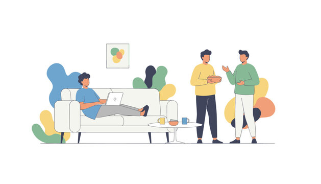 Cozy home scene showing a young man working on his laptop on a sofa while his two flatmates chat and eat snacks in living room.