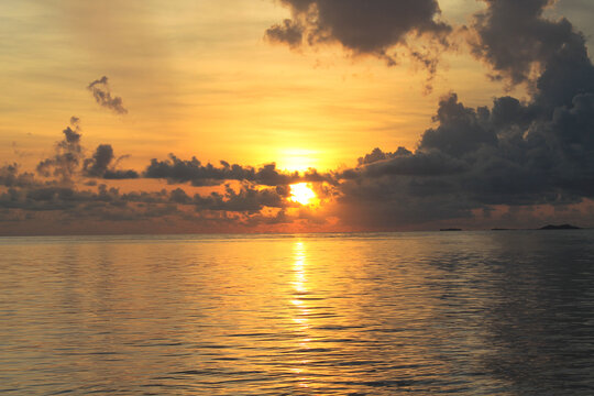 sunset over karimun jawa beach 