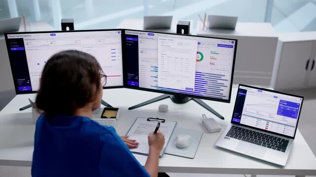 Clinical Trial Manager Reviews Patient Enrollment Data